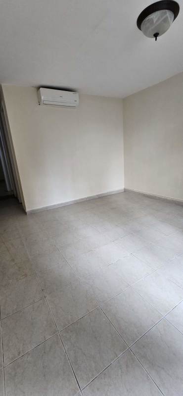 Spacious living room with tile floors and air conditioning in PH San Francisco Panama.