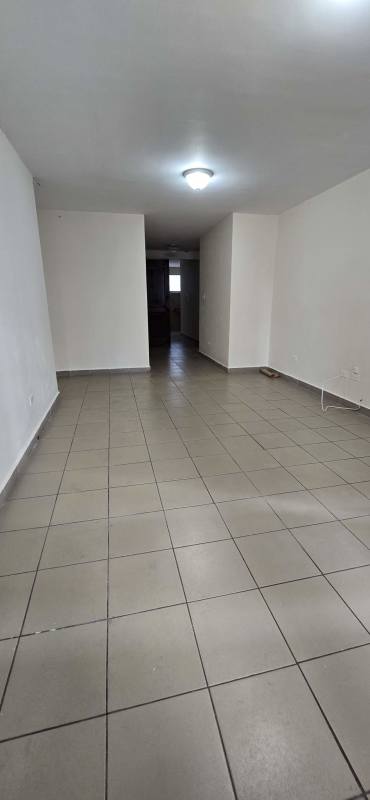 Exterior of PH San Francisco showing balconies and entry area in Panama City.