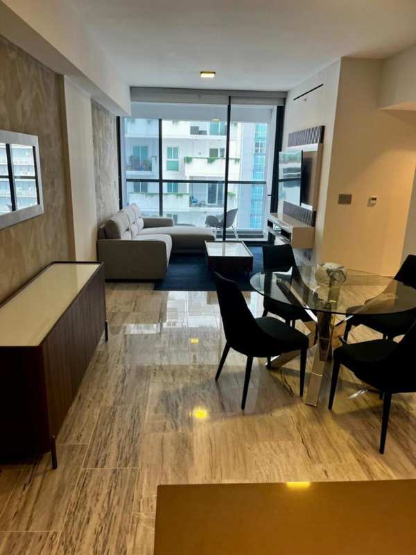 Spacious furnished bedroom with city skyline view PH Nuovo by Armani Casa Panama City