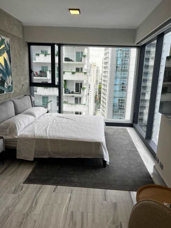 Modern bathroom with marble tiles, glass shower and designer vanity in PH Nuovo