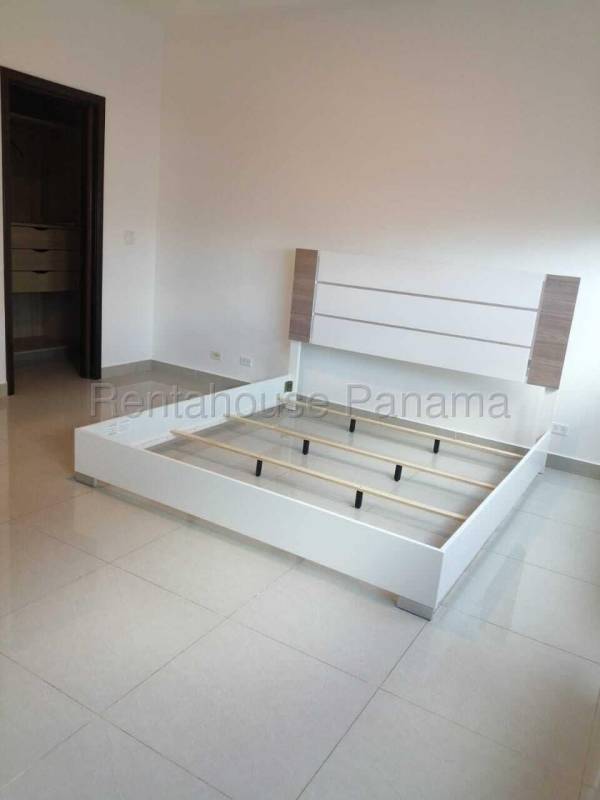 Spacious bedroom with walk-in closet, tiled flooring in PH Aventura Punta Paitilla Panama City rental