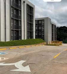 Facade of new PH Valle del Río apartments with parking area Costa Verde Panama