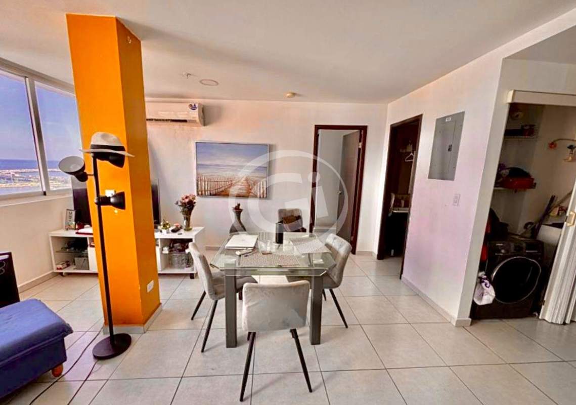 Dining home office space with glass table and city view in PH Bay View Panama City