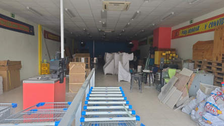 Interior of commercial locale with shelving storage at Centro Comercial 4 Altos Colón Panama