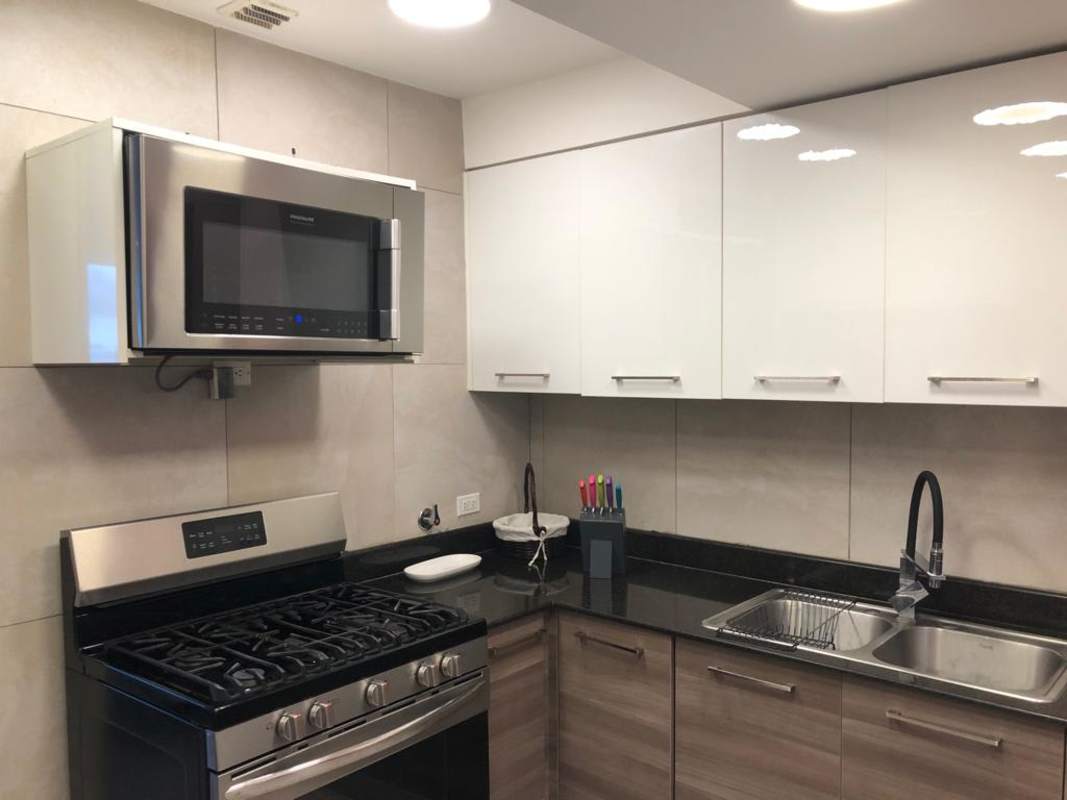 Equipped modern kitchen granite counters stainless appliances Dos Mares Panama