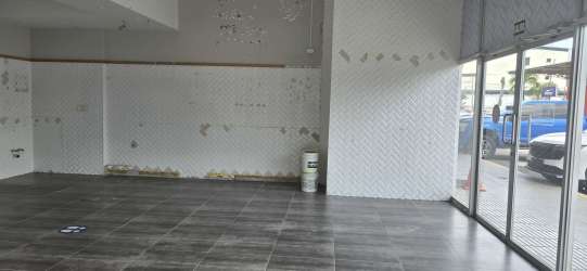 Modern open commercial space with large glass windows at 4 Altos Colón Panama