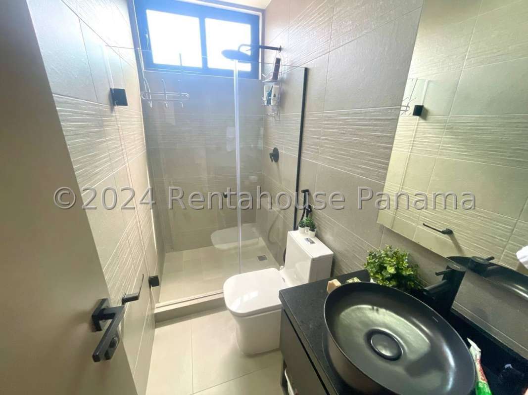 Modern master bedroom with panoramic ocean views in Victory Wellness Tower Coco del Mar Panama