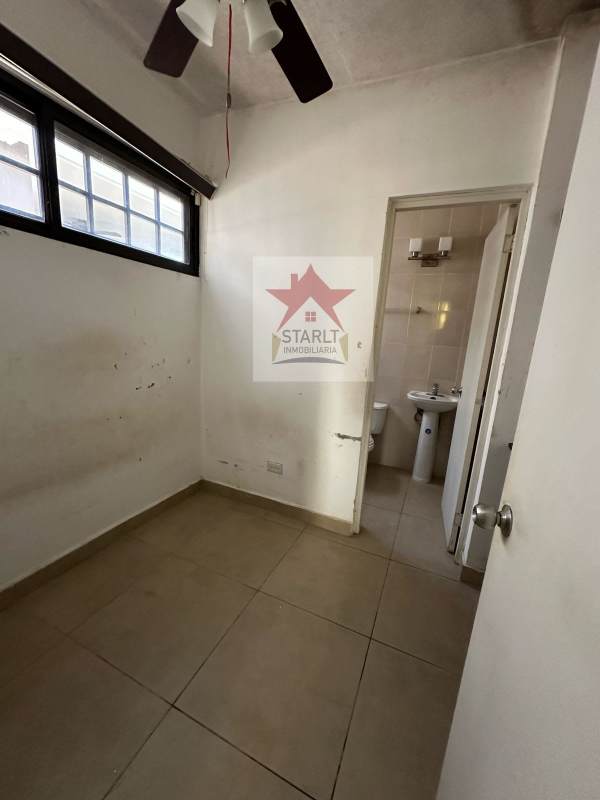 Bright living and dining area with large windows tile floors in PH Olympus Brisas del Golf