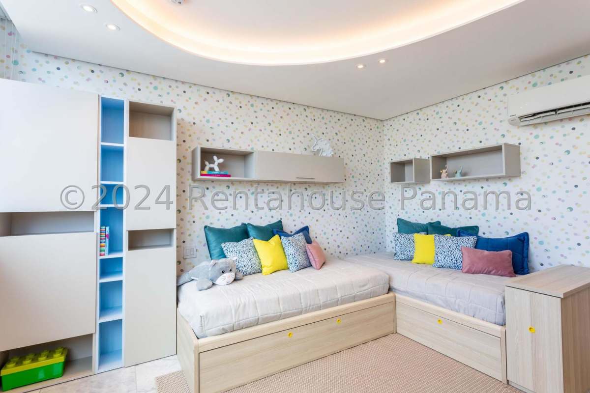 Dining area with panoramic floor-to-ceiling windows and elegant lighting in PH Ocean Front Paitilla