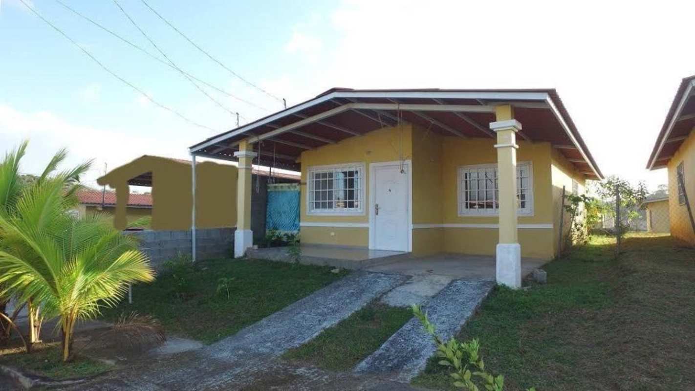 Covered porch and small garden in affordable house for sale in Las Cumbres Panama