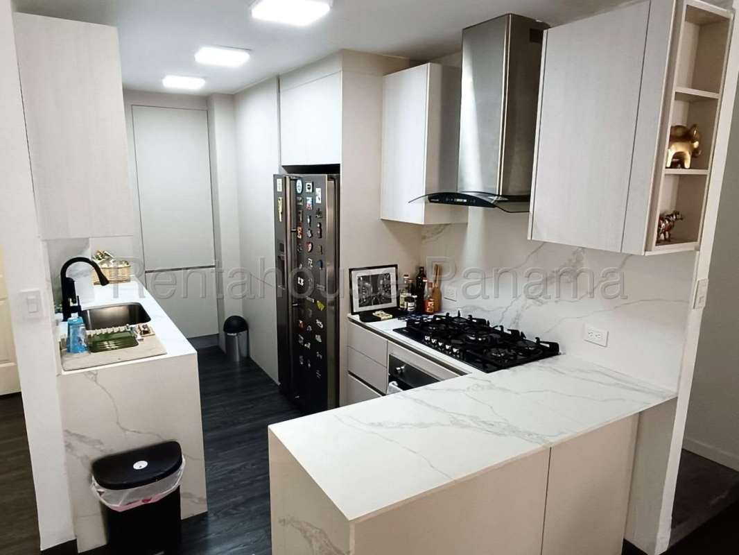 Open living and dining room space with tile floors at PH Torre del Rey Hato Pintado Panama