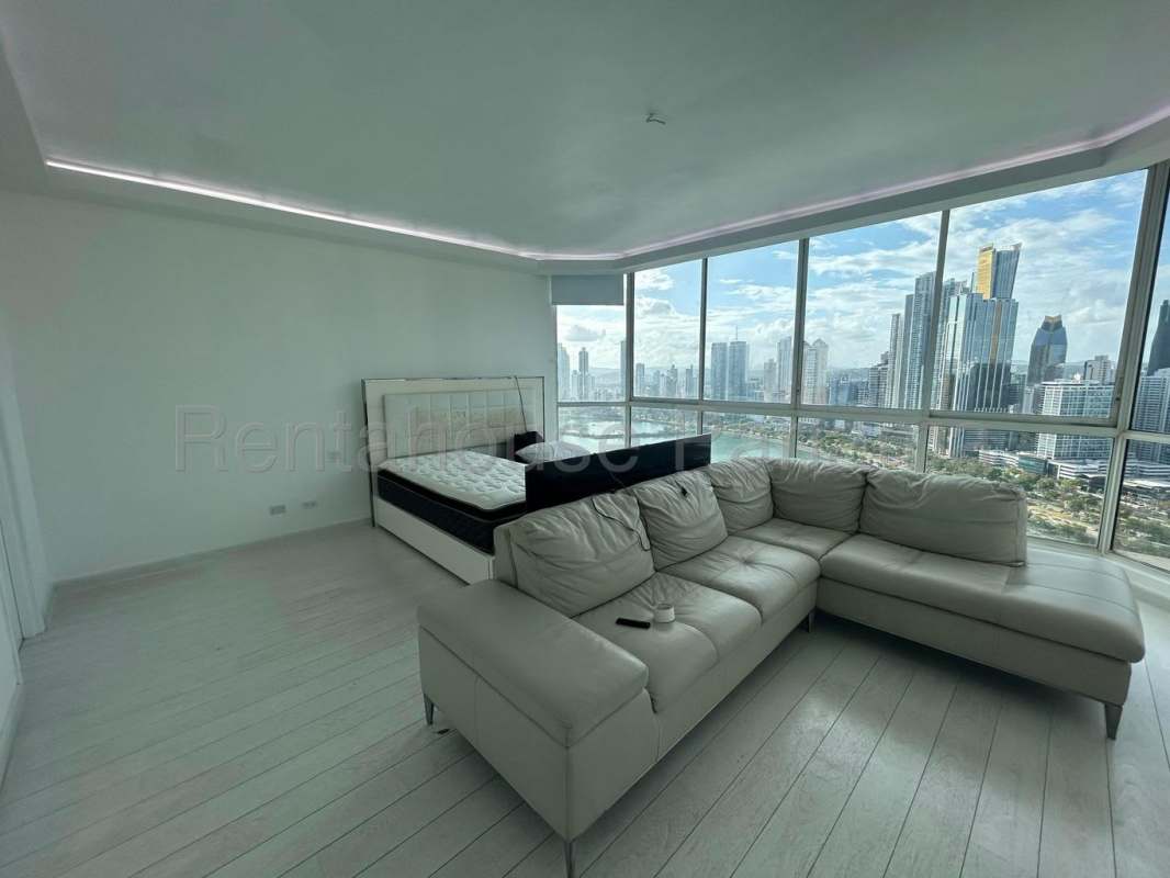 Spacious kitchen with granite counters, wood cabinetry, stainless appliances in PH Peninsula Punta Paitilla Panama