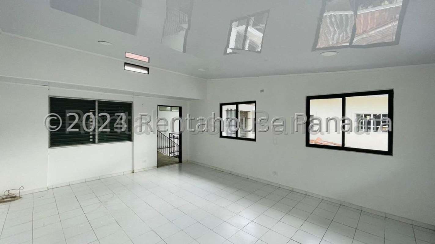 Empty bedroom with barred window and drop ceiling tiles rental Panama City