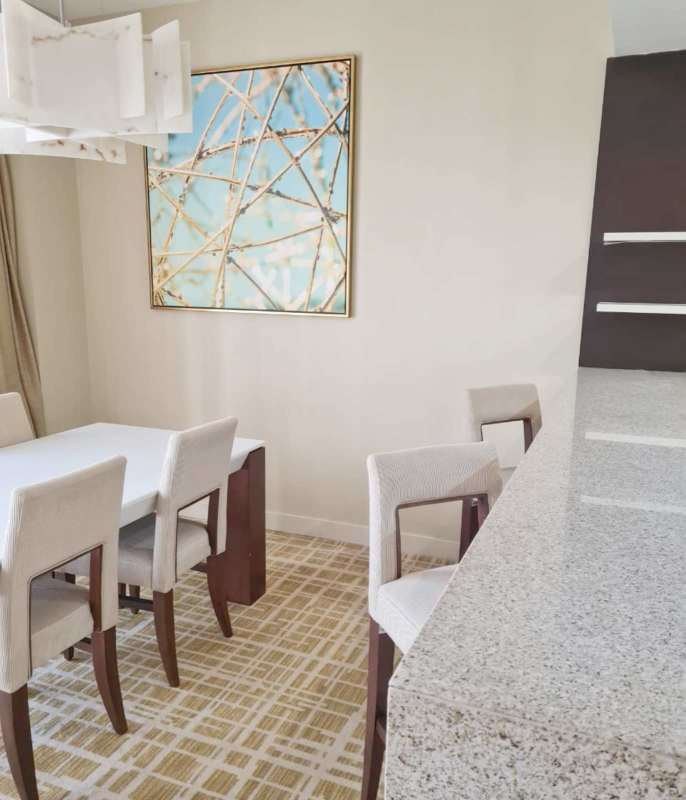 Infinity pool on rooftop of Waldorf Astoria Panama with panoramic skyline view