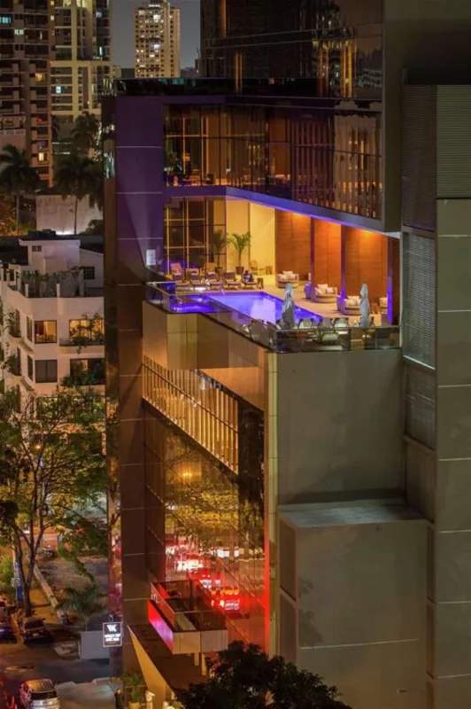 Bedroom with panoramic city view in Waldorf Astoria furnished apartment Panama City