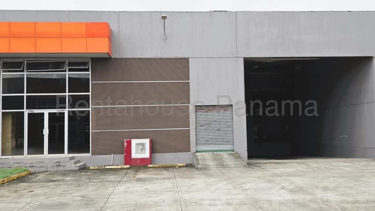 Front view of commercial warehouse with large entrance and loading dock in Pacora Panama