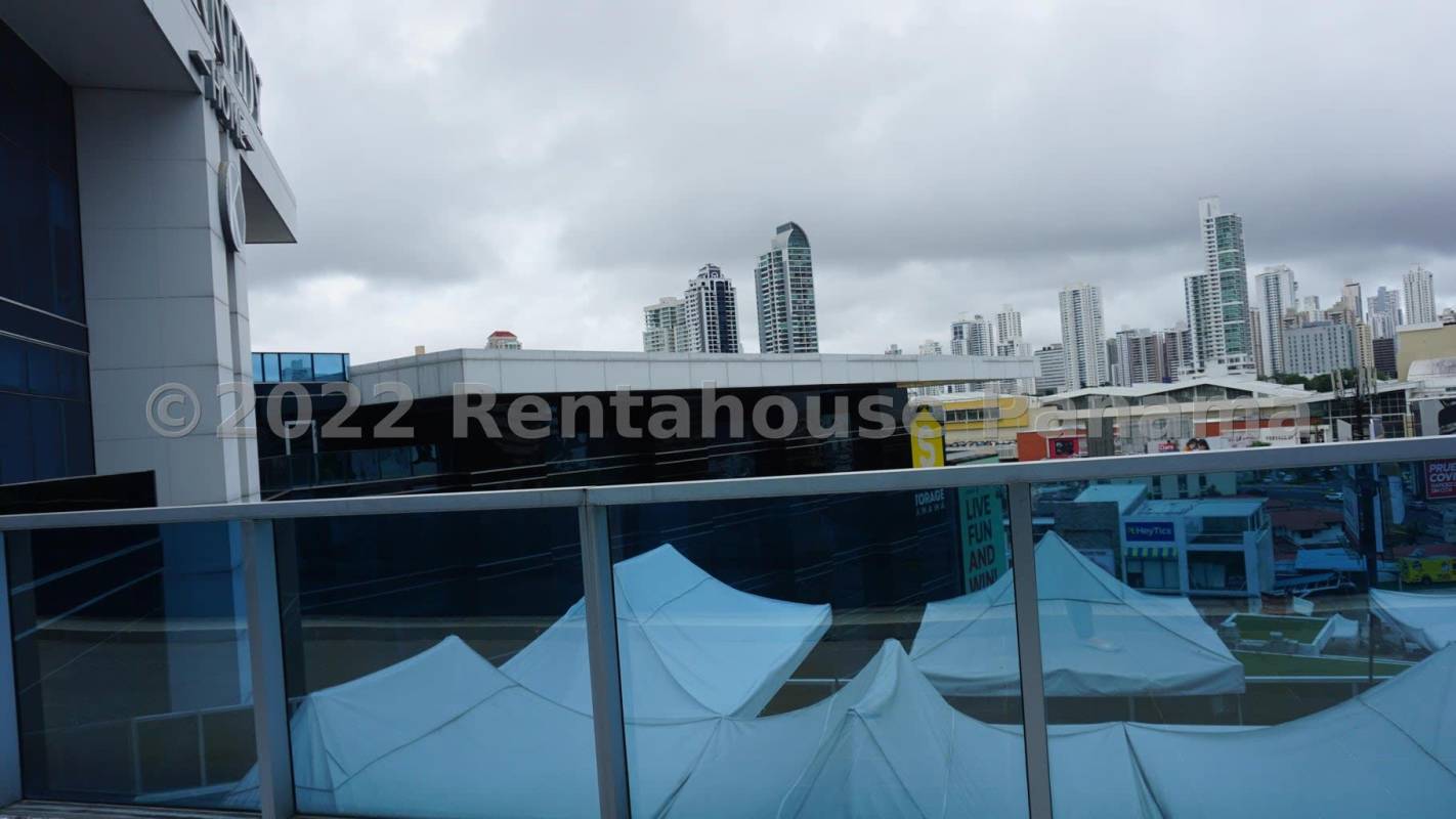Street Mall commercial facade with glass windows Panama City Obarrio