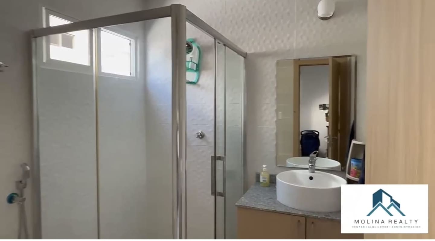 Bathroom with vessel sink and glass shower enclosure Residencial Aventura Panama