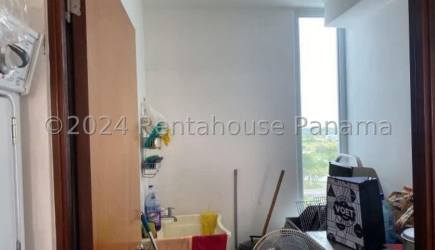 Dining area open to kitchen in furnished beachfront apartment Coral Park Rio Hato Panama