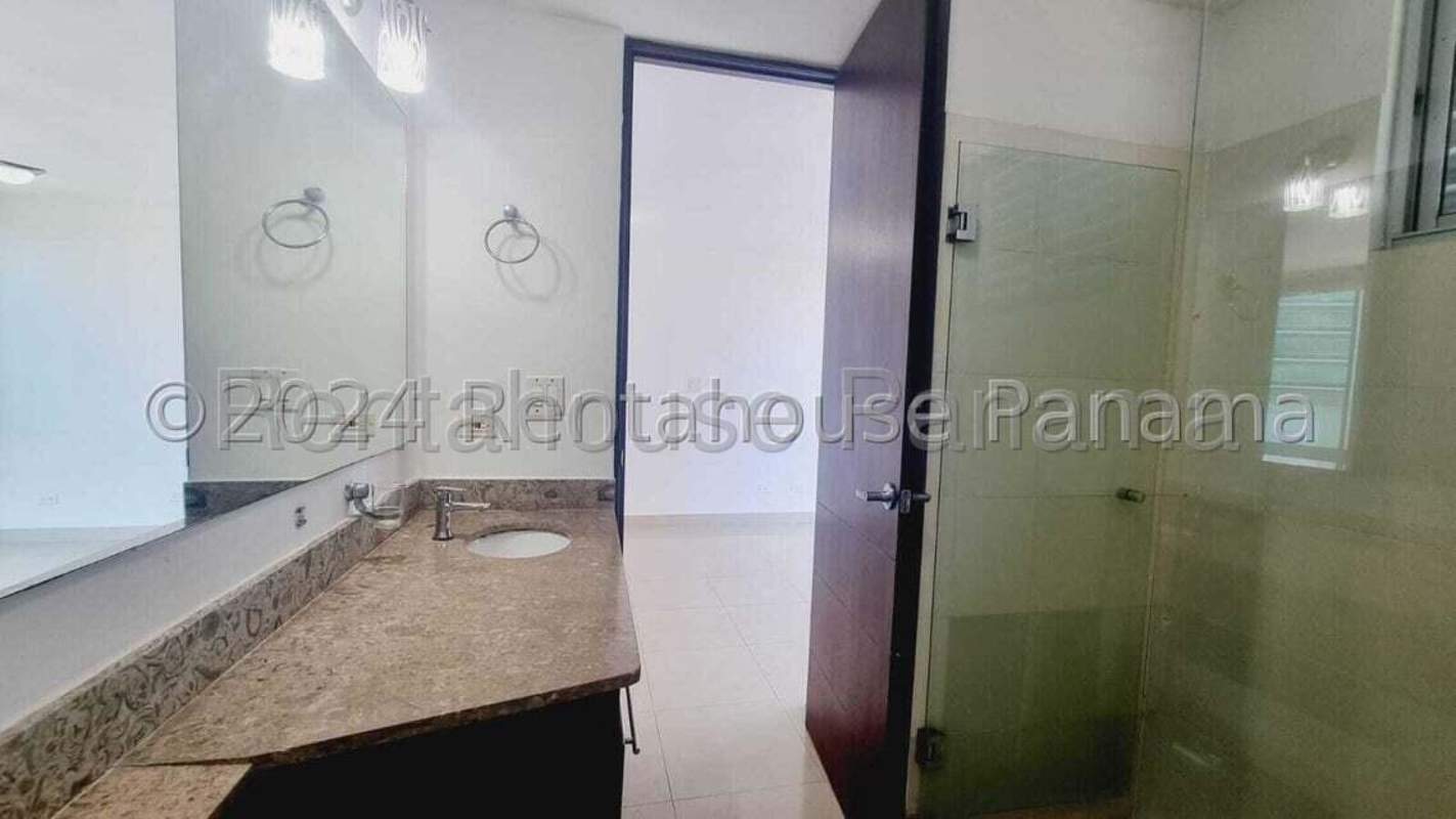 Bright living room with access to private balcony Costa del Este Panama