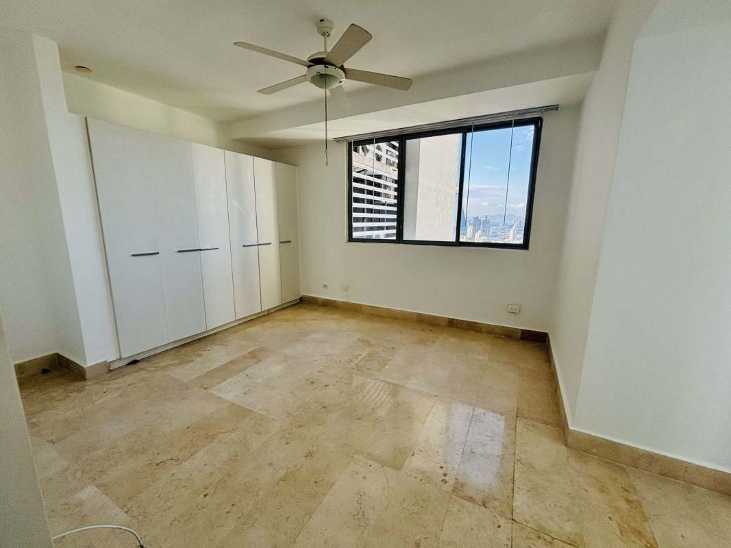 Rooftop infinity pool overlooking ocean and skyline at Yoo Panama Avenida Balboa