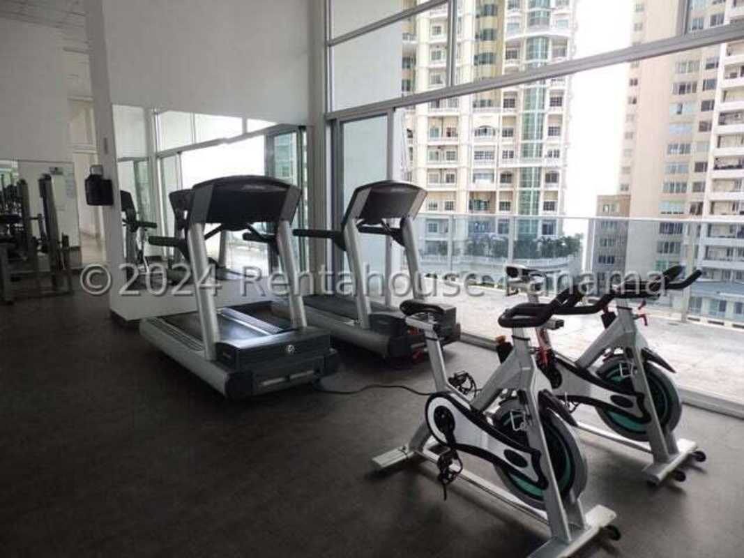 Modern gym with ocean and skyline views in PH Ocean Park Punta Pacifica