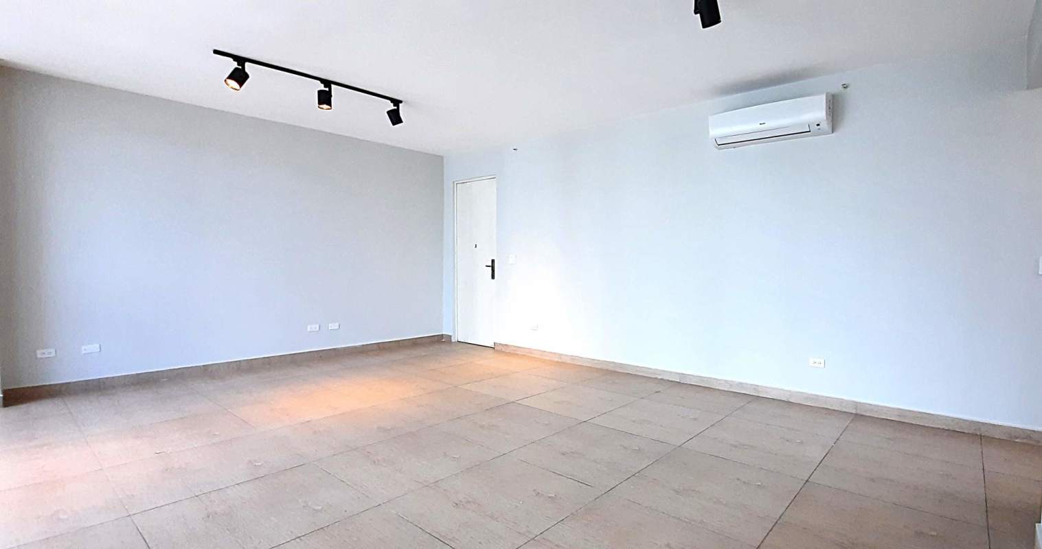 Contemporary kitchen with white cabinets, granite counters in PH Vista del Mar Bella Vista Panama