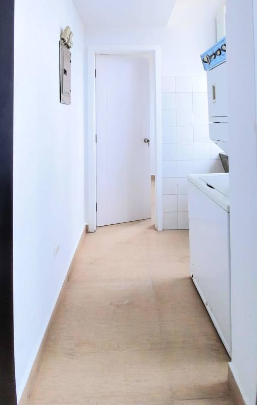 Master bedroom with large windows, ceiling fan, AC and ocean view at PH Vista del Mar Avenida Balboa Panama