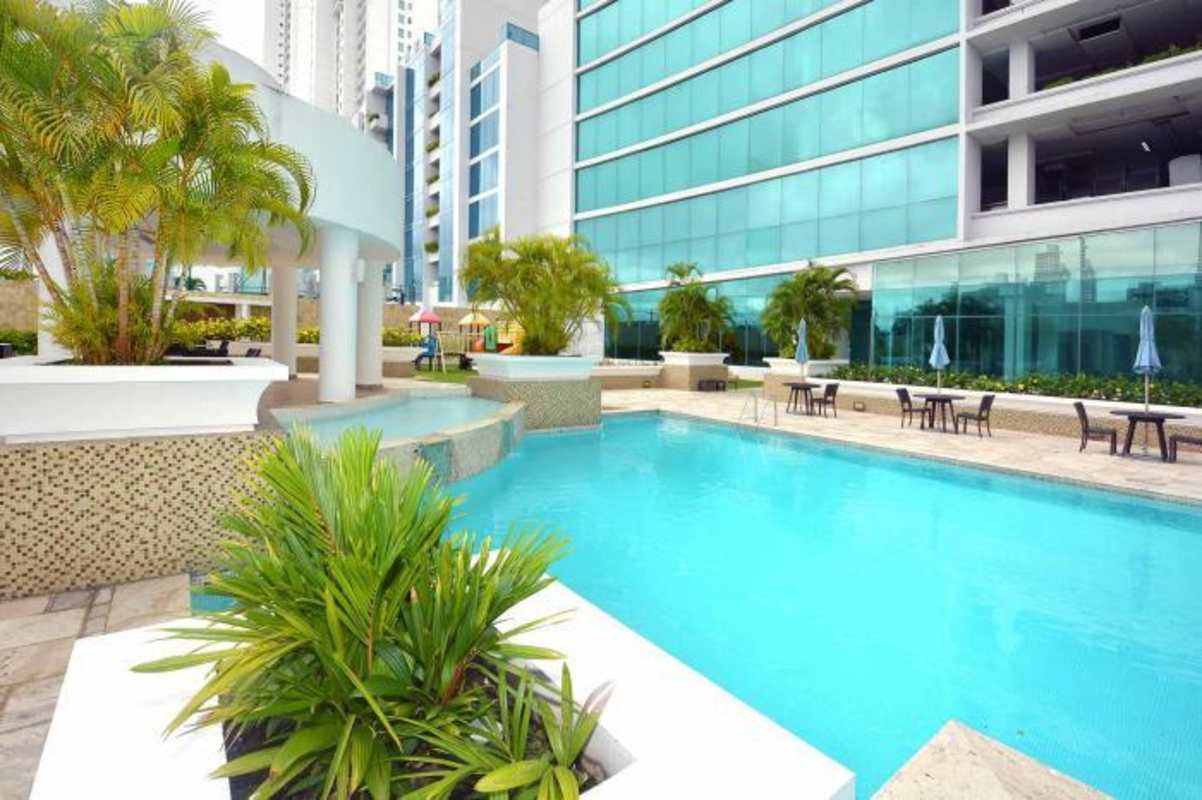 Infinity swimming pool surrounded by tropical landscaping at PH Ocean Two Costa del Este Panama