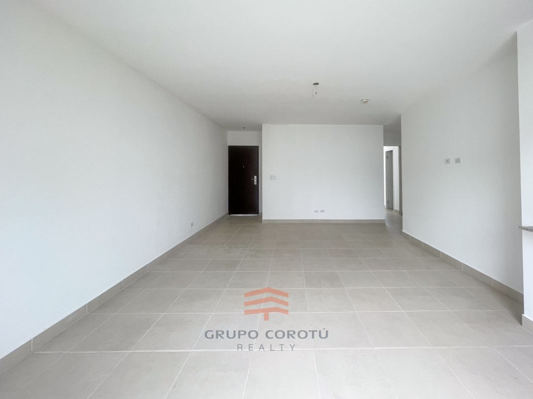 Kitchen with granite countertops, wood cabinetry, modern finishes in Costa Sur house