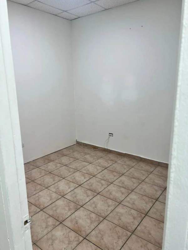 Bright modern office with large windows and tiled flooring Executive Tower El Dorado Panama