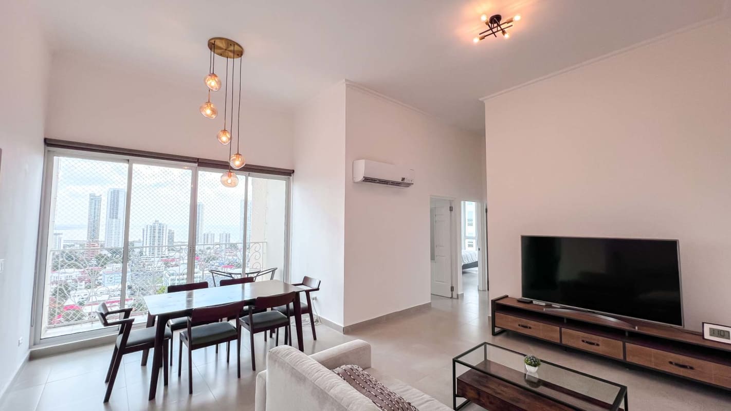Large window in living dining area providing skyline city view rental apartment in PH Costa del Mar Panam City