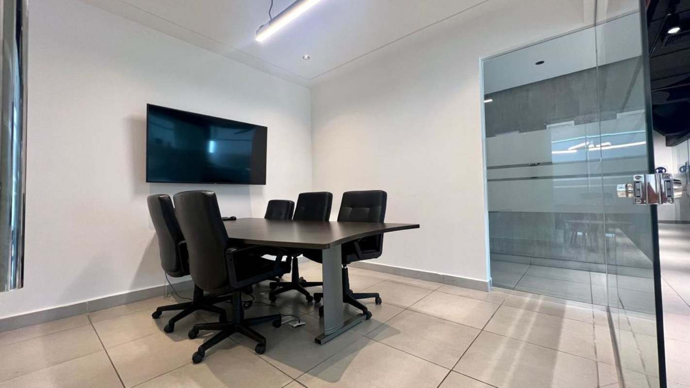 Modern minimalist bathroom with mirror, textured wall tiles, floating vanity, sliding door in PH El Dorado Tower Panama
