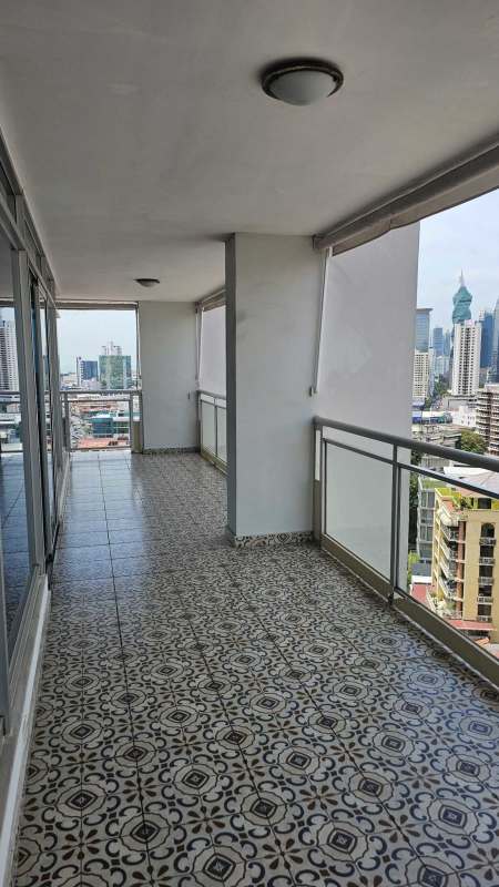 Modern wood cabinetry kitchen with granite counters PH El Carmen penthouse Panama City