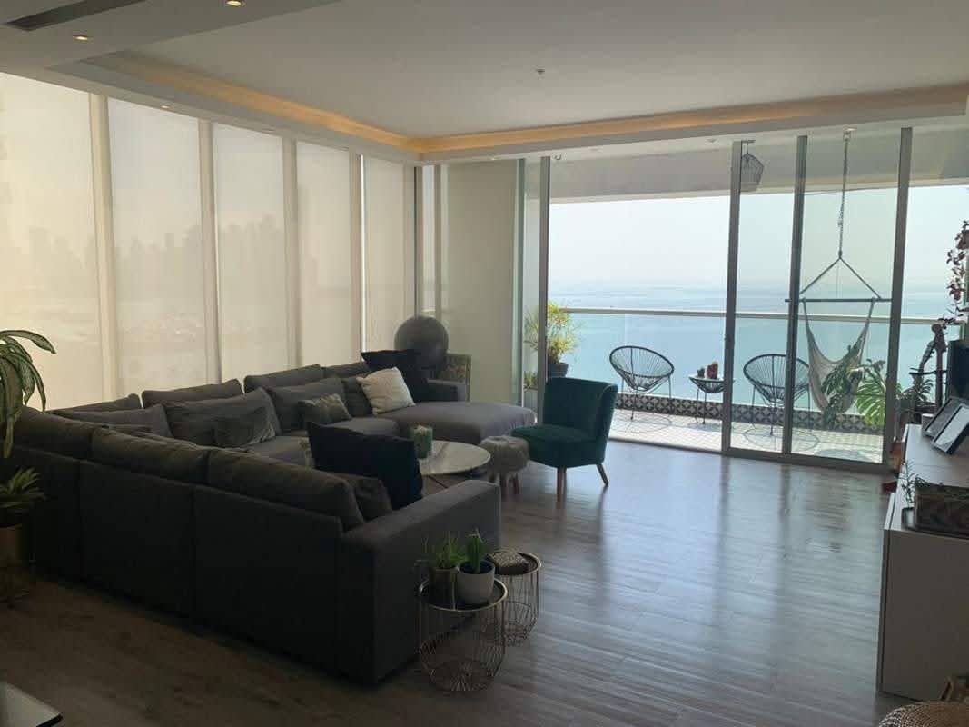 Open-plan living room with panoramic oceanfront views in PH BICSA Financial Tower Condominium Panama City