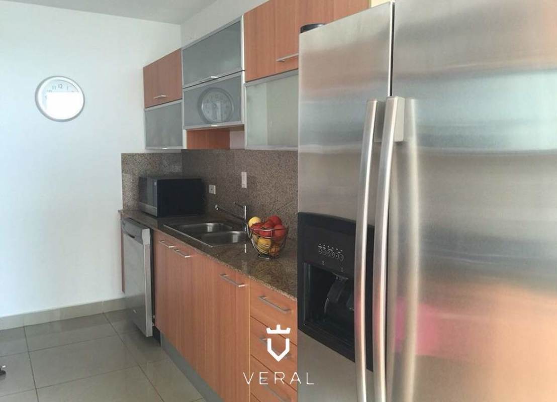 Master bedroom with walk-in closet and ocean view in PH Bahia del Golf Altos del Golf Panama City