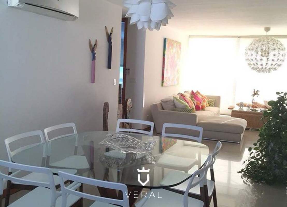 Open living dining area with marble floors and ocean view in PH Bahia del Golf Altos del Golf Panama City