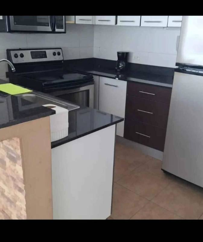 Contemporary kitchen with granite countertops, stainless steel appliances in PH Bayfront Tower Panama