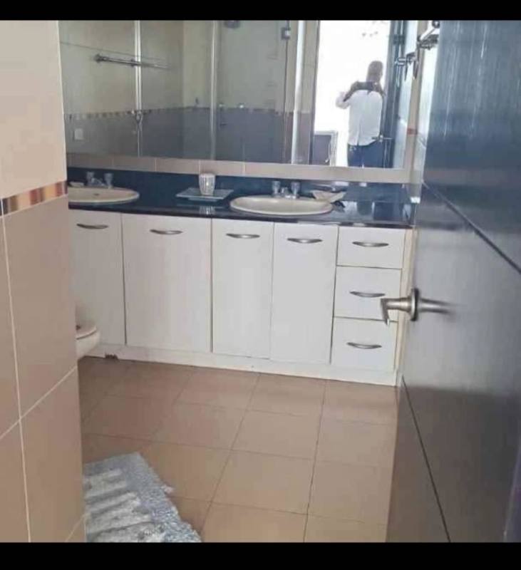 Full gym with panoramic ocean view windows at PH Bayfront Tower Panama City Panama