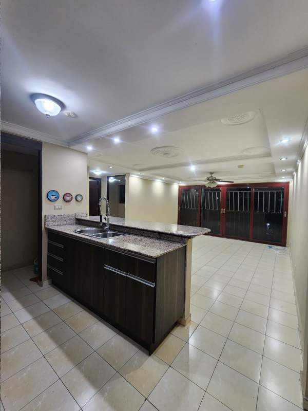 Modern kitchen with granite counters, sink and gas stove PH Danli Panama