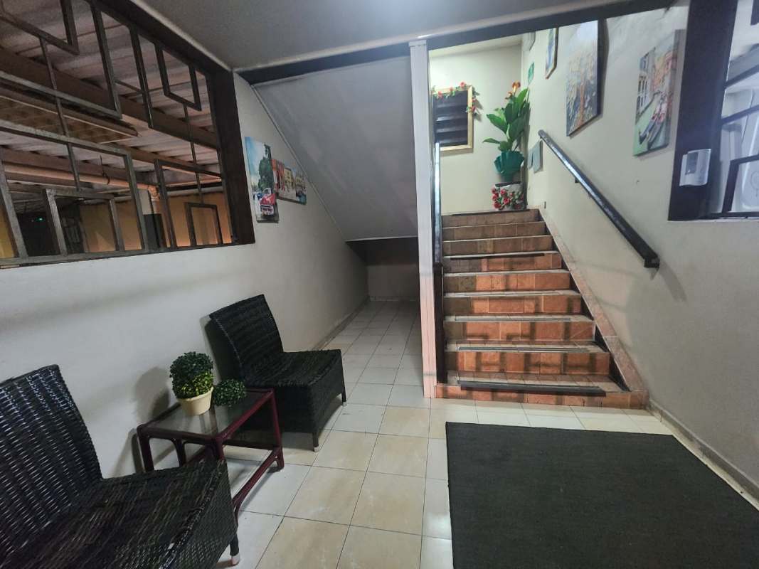 Common area with stairs, sitting area, decorative details PH Danli Panama
