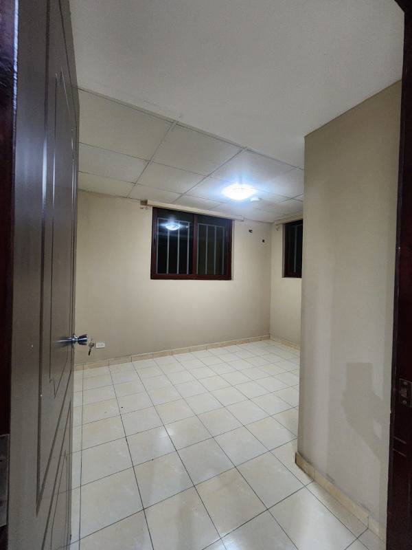 Bright bedroom with tiled floor and secure windows PH Danli Panama
