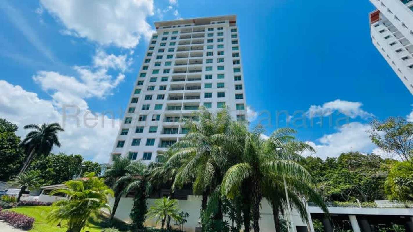 Modern mid-rise apartment building with pool, gardens, and balconies in PH Clayton Park Panama