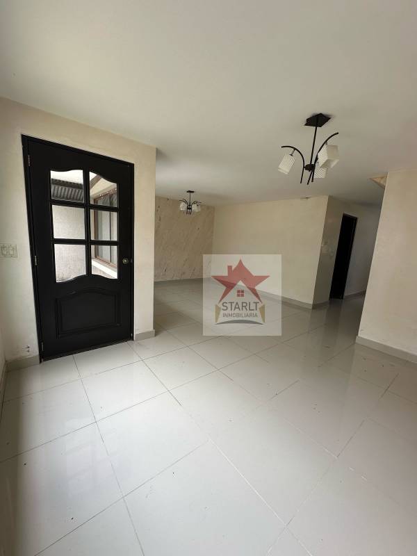 Large bright living dining room tiled floors and modern lights PH Green Village San Miguelito Panama