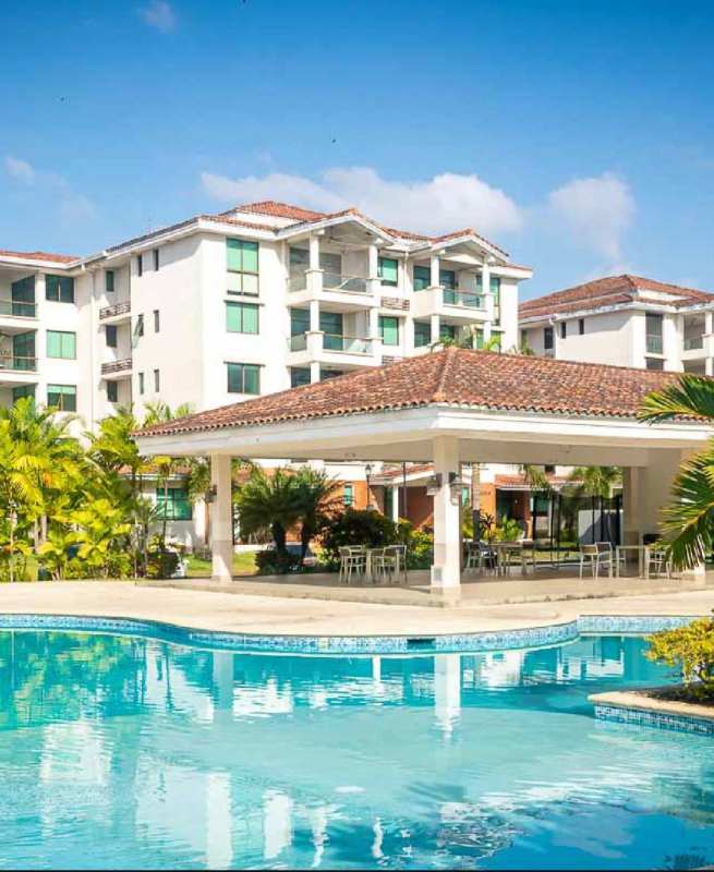 Modern minimalist bathroom with glass enclosed shower tile and vanity in PH Costamare Costa Sur