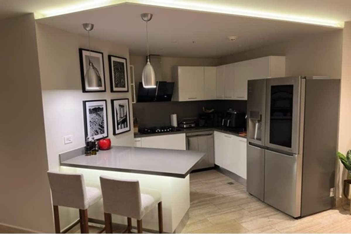 Colorful indoor kids play area with murals, slides, and toy tents in PH Santa Maria Court