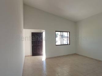 Bright empty interior space with large window ceramic tiled floors in house for sale in Alto Boquete