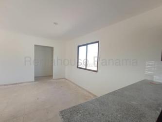 Modern tiled bathroom with pedestal sink and walk-in shower for house in Alto Boquete Panama