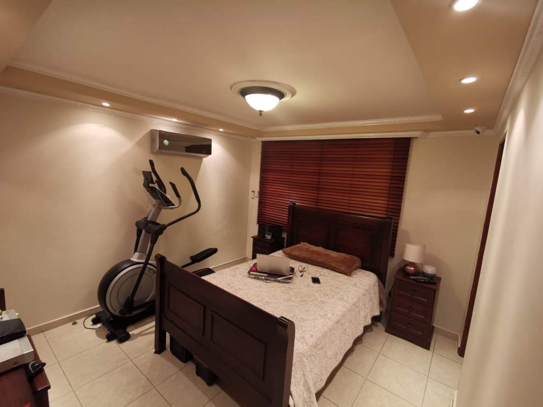 Traditional master bedroom with AC, recessed lighting at Golden Boulevard in El Dorado Panama City