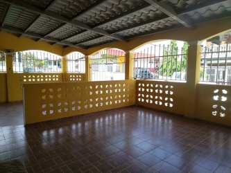 Covered porch area with security wall metal gate corner home Villa del Carmen La Chorrera